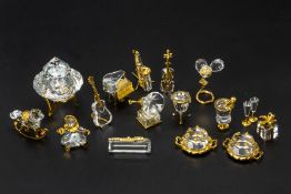 A COLLECTION OF SWAROVSKI MINIATURE GILDED CRYSTAL ITEMS
