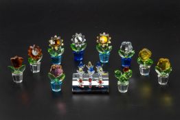 A COLLECTION OF SWAROVSKI FLOWERS