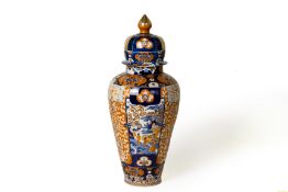 A VERY LARGE IMARI STYLE PORCELAIN JAR AND COVER