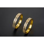 A PAIR OF 22K GOLD HINGED BANGLES