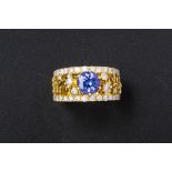 A TANZANITE AND DIAMOND RING BY FOUNDATION JEWELLERS