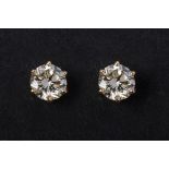 A PAIR OF DIAMOND STUD EARRINGS