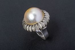 A CULTURED MABE FRESHWATER PEARL RING