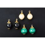 THREE PAIRS OF GOLD MOUNTED BEADS