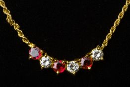 A RUBY AND DIAMOND PENDANT NECKLACE