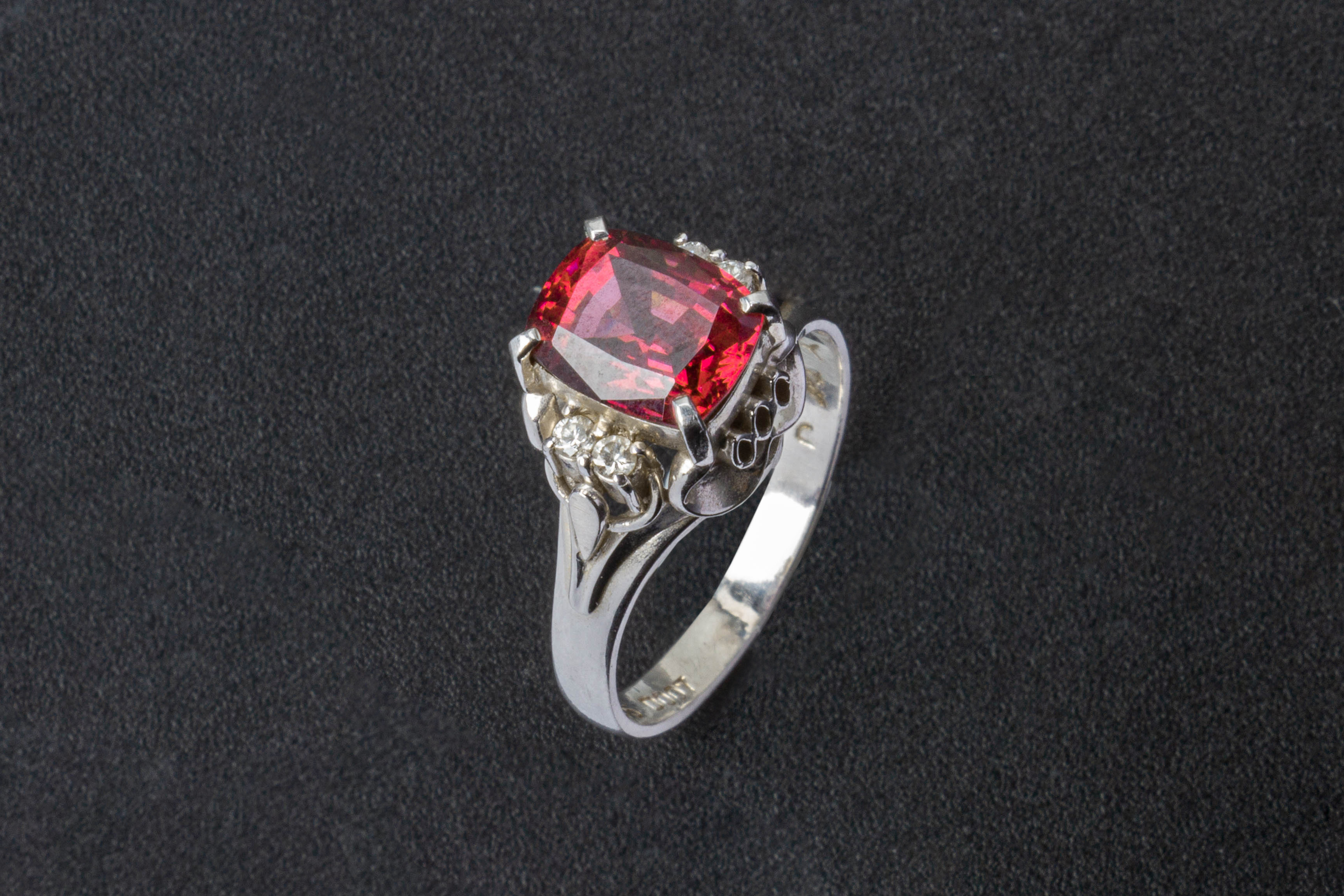 A GARNET AND DIAMOND RING