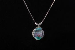 AN OPAL AND DIAMOND PENDANT ON CHAIN