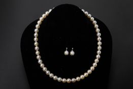 AN AKOYA CULTURED PEARL NECKLACE AND EARRING SET