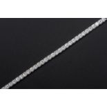 A DIAMOND TENNIS BRACELET