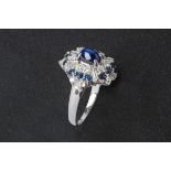 A SAPPHIRE AND DIAMOND RING