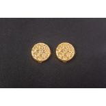 A PAIR OF GOLD BUTTON COVERS BY STELLA