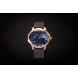 A LADIES GOLD GIRARD-PERREGAUX CAT'S EYE AUTOMATIC WATCH