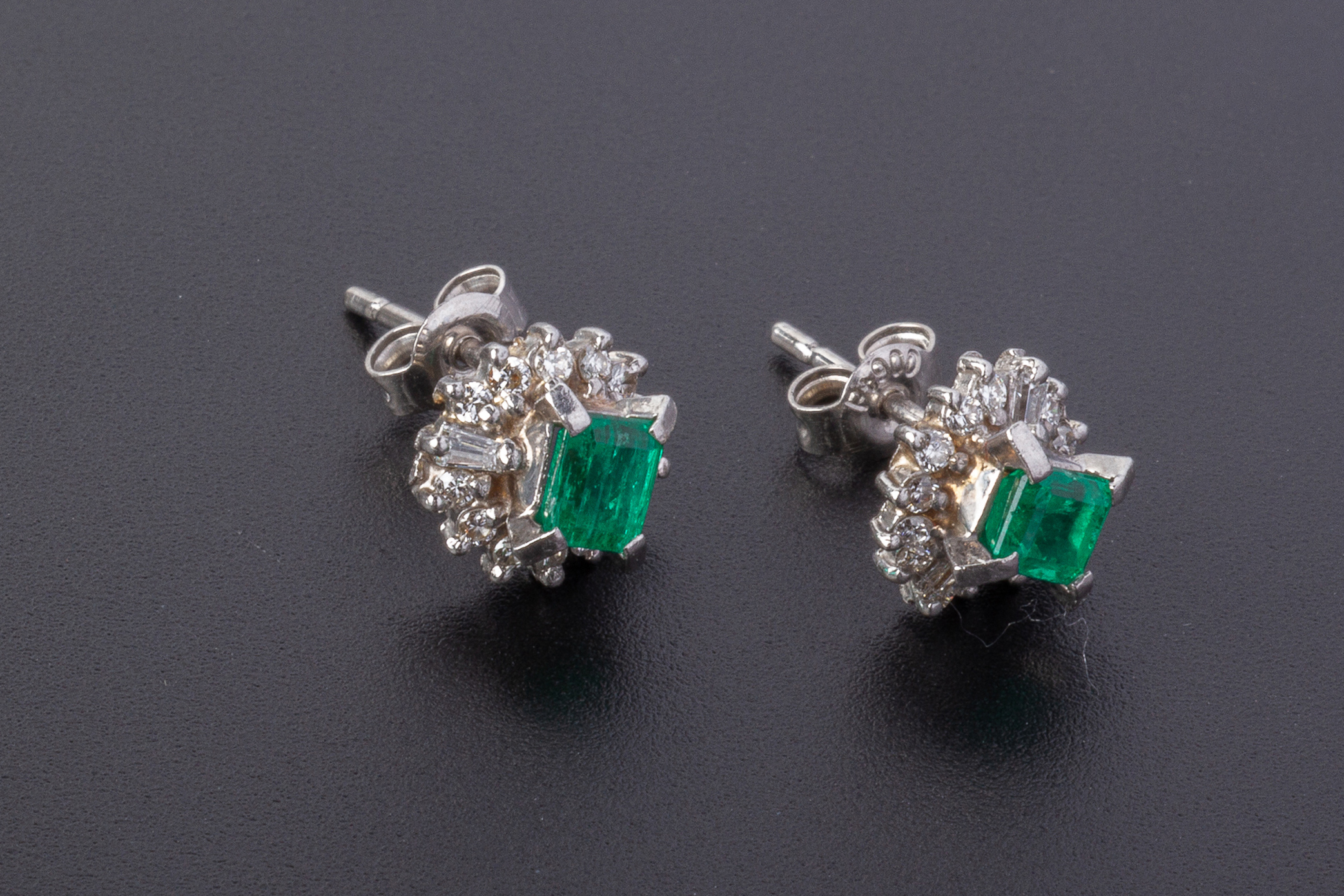 A PAIR OF EMERALD AND DIAMOND EARRINGS