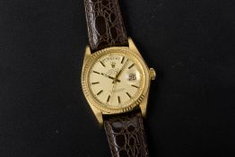 A ROLEX GOLD OYSTER PERPETUAL DAY DATE AUTOMATIC WRISTWATCH