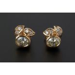 A PAIR OF DIAMOND STUD EARRINGS