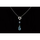 AN ART DECO STYLE AQUAMARINE AND DIAMOND PENDANT NECKLACE