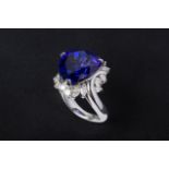 A LARGE TANZANITE AND DIAMOND RING