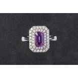 AN UNHEATED PURPLE SAPPHIRE AND DIAMOND RING