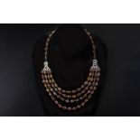 A SPINEL AND DIAMOND NECKLACE AND EARRINGS SET