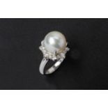 A CULTURED SOUTH SEA PEARL AND DIAMOND RING