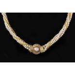 A FIVE STRAND CULTURED PEARL AND GOLD NECKLACE