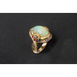 AN OPAL, SAPPHIRE AND DIAMOND RING