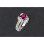 A RHODOLITE GARNET AND DIAMOND RING