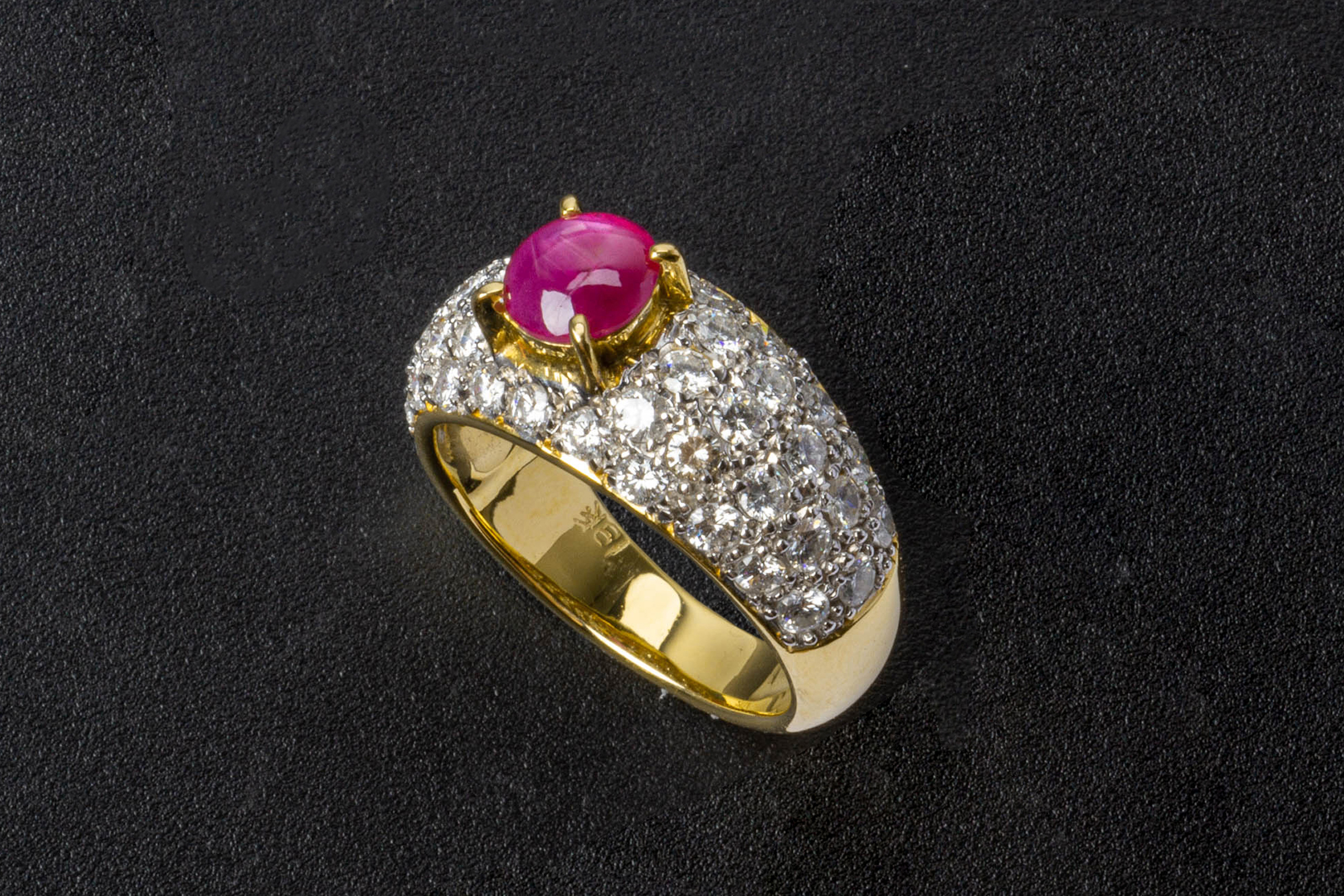 A STAR RUBY AND DIAMOND RING