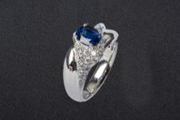 A BLUE SAPPHIRE AND DIAMOND RING