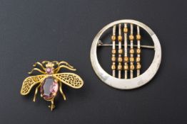 A MODERNIST SILVER BROOCH AND A GILT METAL BEE BROOCH