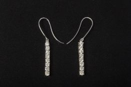 A PAIR OF ARTICULATED DIAMOND EARRINGS