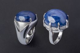 TWO LARGE UNHEATED STAR SAPPHIRE AND DIAMOND RINGS