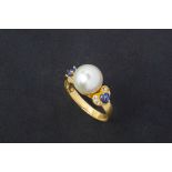 A CULTURED PEARL, BLUE SAPPHIRE AND DIAMOND RING