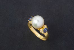 A CULTURED PEARL, BLUE SAPPHIRE AND DIAMOND RING