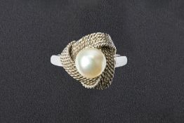 A CULTURED PEARL RING