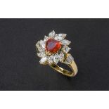 A RUBY AND DIAMOND CLUSTER RING