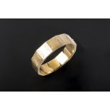 A 14K GOLD HINGED BANGLE