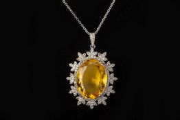 A CITRINE AND DIAMOND PENDANT