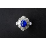 A BLUE SAPPHIRE AND DIAMOND CLUSTER RING