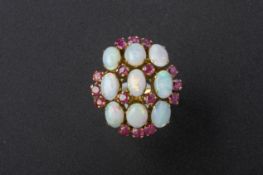 AN OPAL AND RUBY COCKTAIL RING
