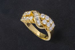 A DIAMOND CROSS-OVER RING