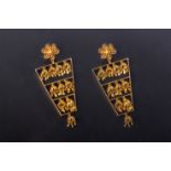 A PAIR OF INDIAN GOLD EARRINGS