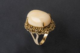 A LARGE CORAL RING