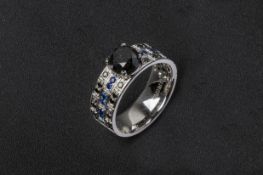 A BLACK DIAMOND AND SAPPHIRE RING