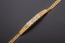 A GOLD AND DIAMOND BRACELET