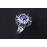 A SAPPHIRE AND DIAMOND RING