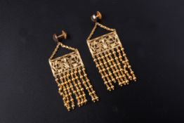 A PAIR OF INDIAN GOLD EARRINGS