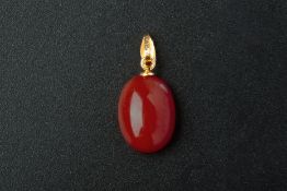 A CORAL PENDANT