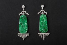 A PAIR OF CARVED JADE AND DIAMOND EARRINGS