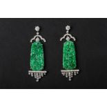 A PAIR OF CARVED JADE AND DIAMOND EARRINGS